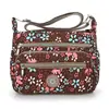 Bolso Cruzado de Hombro Personalizado Nuevo Simple Literario Casual Tela Lavada Impermeable Lona Tela de Nylon Estilo Coreano Bolso de Moda para Mujer
