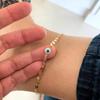 Tobillera de cadena de tobillo con cuentas de cuentas redondas de moda transfronteriza europea y americana, tobillera con lentejuelas de cadena de hueso de serpiente plana multicapa, ojo de la suerte