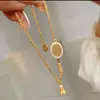 Popular Racket de Bádminton Coreano de Xiaohongshu Collar de Diamantes Tres Juegos de Diseño de Nicho Elegante Elegante Una Pieza Envío Directo