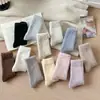Calcetines de vellón de coral sin pelusa transfronterizos para hombre y mujer, calcetines de vellón de color liso, media caña, cálidos para dormir, calcetines de piso