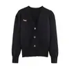 Venta al por mayor de Ropa para Mujer Transfronteriza Primavera 2026 Nueva Moda Casual Holgado Color Sólido Versátil Cardigan de Punto con Broche
