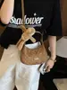 Bolso nuevo de principios de otoño transfronterizo para mujer, bolso de mano de lunares estilo coreano 2026, bolso de hombro de oso lindo, bolso cruzado tipo dumpling