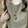 Otoño e Invierno 2025 Popular Collar Largo Retro con Borlas para Mujer Nicho de Gama Alta Versátil Elegante Cadena para Suéter Sudadera