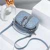 Bolsa pequena Lingge feminina 2024 nova moda borla pequena bolsa redonda textura ombro portátil bolsa mensageiro uma geração de cabelo