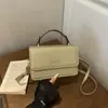 Diseño de nicho, bolso de mano de alta gama, nueva colección otoño 2026, retro moderno, minimalista, adecuado para ir al trabajo, bolso cuadrado pequeño, bolso de hombro, bolso cruzado