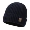 Sombrero de invierno más vendido para exteriores: Gorro de punto grueso con forro de polar, moderno y cálido, diseñado para jóvenes, con protección para las orejas y características resistentes al frío.