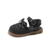 Niña Pequeña 2026 Dulce Cabeza Versátil Suela Suave Sandalias Infantiles Moño Cubierto Princesa Primavera Verano Zapatos Nuevos