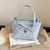 Bolso Cubo de Estilo Dulce y Femenino con Lazo de Lunares Bolso de Mano para Mujer 2026 Verano Nueva Moda Bolso Cruzado Versátil