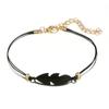 Pulsera de cadena con charm de nudo de hoja estilo bohemio, pulsera de amor negra, pulsera de cuentas de loto, pulsera de hoja, juego de 4 piezas