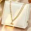 Bestseller transfronterizo: Colgante de anillo de bola de oro pequeño no descolorante de acero de titanio simple, cadena para la clavícula de lujo ligero, exquisita y versátil con eslabones grandes