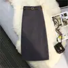 Saia de Terno de Lã Cinza para Mulheres Outono e Inverno 2025 Nova Cintura Alta Slim Comprimento Médio Corte Evasê Cobre o Quadril Saia Tubinho