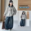 Conjunto de moletom feminino 2026 primavera e outono novo estilo universitário moletom com gola jeans falso conjunto de duas peças moderno