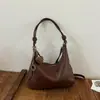 Tendência minimalista transfronteiriça outono 2026 nova moda bolsa de trabalho feminina casual personalizada bolsa de ombro transversal