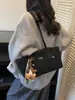 Bolsa de Ombro Transfronteiriça para Mulheres 2026 Outono e Inverno Novo Estilo Alto Valor Retrô Versátil Grande Capacidade Bolsa Tote de Ombro para o Dia a Dia
