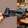 Pinza Plátano Plisada Vertical con Lazo Floral para Cola de Caballo de Verano 2026 Nuevos Pasadores para la Parte Posterior de la Cabeza Accesorios para el Cabello