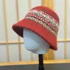 Elegante sombrero de pescador tejido estilo coreano para mujer, perfecto para otoño e invierno, te mantiene abrigada, hace que tu rostro luzca más pequeño, presenta colores contrastantes y es un accesorio versátil para salidas.