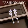 Pendientes de borla con tachuelas de perlas de aguja de plata transfronterizos, pendientes de temperamento suave y elegante, pendientes versátiles de lujo ligero y alta gama para mujer