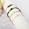 Estilo Europeu e Americano Elemento de 8 caracteres Quadrado Geométrico Preto Folhas Pulseira de 5 Peças Corda Usada na Mão Pulseira de Amor B4119