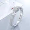Suministro europeo y americano exquisito traje de anillo de pulsera de leopardo moda dominante pulsera bicolor oro y plata regalo femenino