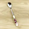 Venta al por mayor de fábrica mango de cerámica de acero inoxidable patrón floral exportación transfronteriza Amazon tamaño pequeño cuchara para remover tenedor de fruta
