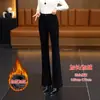 Elegantes pantalones cigarette negros de cintura alta con detalles de hebilla metálica, forrados de felpa y engrosados, adecuados para personas altas, versátiles y elegantes para otoño e invierno.