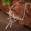 Collar Navideño de Astas Transfronterizo para Mujer, Líneas Geométricas Personalizadas de Alta Gama, Cadena para el Cuello Versátil de Reno con Colgante de Hueso de Serpiente