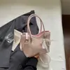 Bolsa de palha trançada estilo retrô para mulheres, nova moda 2026, versátil, de ombro e transversal, bolsa de mão de alta qualidade