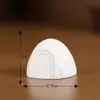 Adornos de paisaje en miniatura con personajes de dibujos animados de animales lindos: conejos, ardillas, pingüinos juguetones. Accesorios de resina en un estilo moderno y minimalista