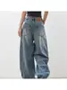 Jeans azules de estilo americano con dobladillo curvo para mujer, nuevo estilo primavera 2026, pantalones anchos holgados con un elegante diseño de corte banana de cintura alta