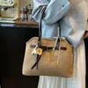 Bolsa Retro Esmerilada de Gama Alta para Mujer 2025 Nuevo Bolso de Hombro/Axila Versátil para el Trabajo de Moda Bolso Tote Pequeño Súper Popular