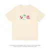 Camiseta de Algodón Puro con Cuello Redondo y Manga Corta en el Hombro Derecho para Mujer Nuevo Estilo Japonés de Verano Diseño 'Wake-Up' Top de Nicho para Hombre Tendencia al por Mayor