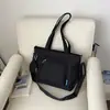 Bolso de hombro versátil de color liso, nuevo para el otoño de 2026, bolso tote de gran capacidad, bolso cruzado para estudiante y para el día a día, transfronterizo