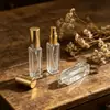 Botella dispensadora de perfume de vidrio de 10 ml Botella de muestra de perfume con tapa de rosca Botella de perfume portátil Botella de perfume