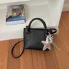 Bolso de mano de alta gama para mujer, modelo nuevo 2026, bolso de hombro y cruzado súper popular, bolso tote pequeño exquisito, bolso tipo cubo versátil