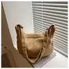 Bolsa de Ombro de Lona de Grande Capacidade Feminina 2025 Primavera e Verão Nova Cor Pura Simples Moda Casual Bolsa Transversal Tendência