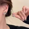 Pendientes de plata 925 con forma de mariposa y circonita hueca, estilo francés, con temperamento de hada súper elegante y delicado estilo de hada.