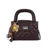 Bolso pequeño súper popular para mujer, nuevo modelo de primavera 2026, bolso de hombro pequeño estilo Chanel, bolso cruzado de cadena acolchado