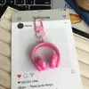 Llavero Minimalista Dulce Fresco de Auriculares 3D Colgante para Mochila de Estudiante Accesorio de Mochila de Estilo Fresco Creativo Regalo para Mejor Amigo