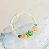 Jingdezhen Navidad Pulsera de Cuerda Trenzada de Cerámica Pulsera de Trébol de Cuatro Hojas Joyería Artística Hecha a Mano Venta al por Mayor Pulseras de Cerámica para Atracciones Turísticas