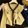 Fábrica de Suéteres Dalong Otoño 2026 Melard Estilo Dulce Chic Suéter Cardigan de Punto con Cuello en V Abrigo para Mujer