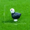 Una colección de adorables figuritas de animales en miniatura para crear paisajes en miniatura, perfectas para decoraciones de casa de muñecas DIY, adornos para coche y expositores de escritorio