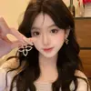 Pendientes de Trébol de Cuatro Hojas Huecos con Circonita Dorada para Mujer de Alta Gama Lujo Ligero Temperamento Pendientes de Tachuela Únicos Hermosos Exagerados Joyería para Orejas