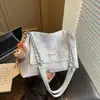 Bolsa Tote de Ombro Único Exclusiva Versátil Transfronteiriça Design de Nicho Moda de Trabalho Outono 2026 Bolsa de Ombro Alta