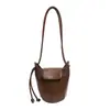 Moda transfronteriza 2026 diseño de nicho nuevo bolso cubo para mujer retro simple sensación de alta gama versátil bolso de hombro único para dama