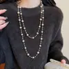 Nuevo collar de perlas artificiales de doble capa, cadena para la clavícula de moda exquisita transfronteriza, cadena de suéter de lujo ligero estilo francés