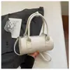 Bolsa de Mão Cilíndrica Exquisita e Moderna 2026 Nova Bolsa Transversal Versátil Feminina Pequena Bolsa Tote Bolsa Almofada