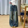 Jeans de Pierna Ancha Rasgados de Cintura Baja Estilo Chica Picante Americana para Mujer Otoño 2026 Nuevos Pantalones Rectos de Pierna Larga Sueltos Adelgazantes Versátiles