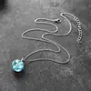 Collar con colgante de bola transparente de resina con nubes blancas y cielo azul creativo de estilo europeo y americano transfronterizo.