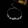 Pulsera de Mariposa y Flor de Circonita Super Brillante Estilo Coreano, Sensación de Lujo Ligero y Gama Alta, Moda de Nicho, Accesorio de Mano Versátil para Mujer
