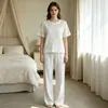 Conjunto de pijama transfronterizo para mujer europeo y americano, nuevo estilo primavera y otoño, ropa de casa de algodón suave, estampado de color liso, conjunto cómodo y casual de dos piezas